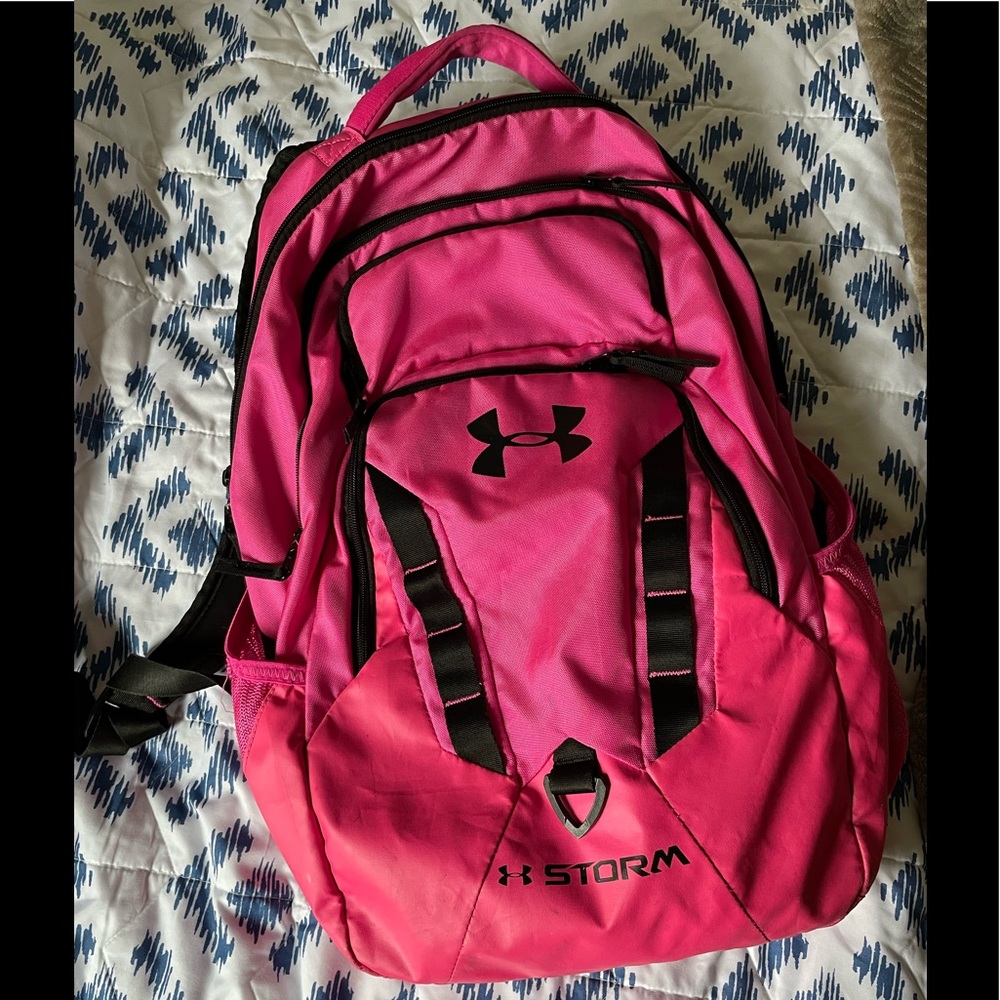 Pink Under Armour backpack.